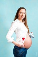 Фото девушки на 9-м месяце беременности
